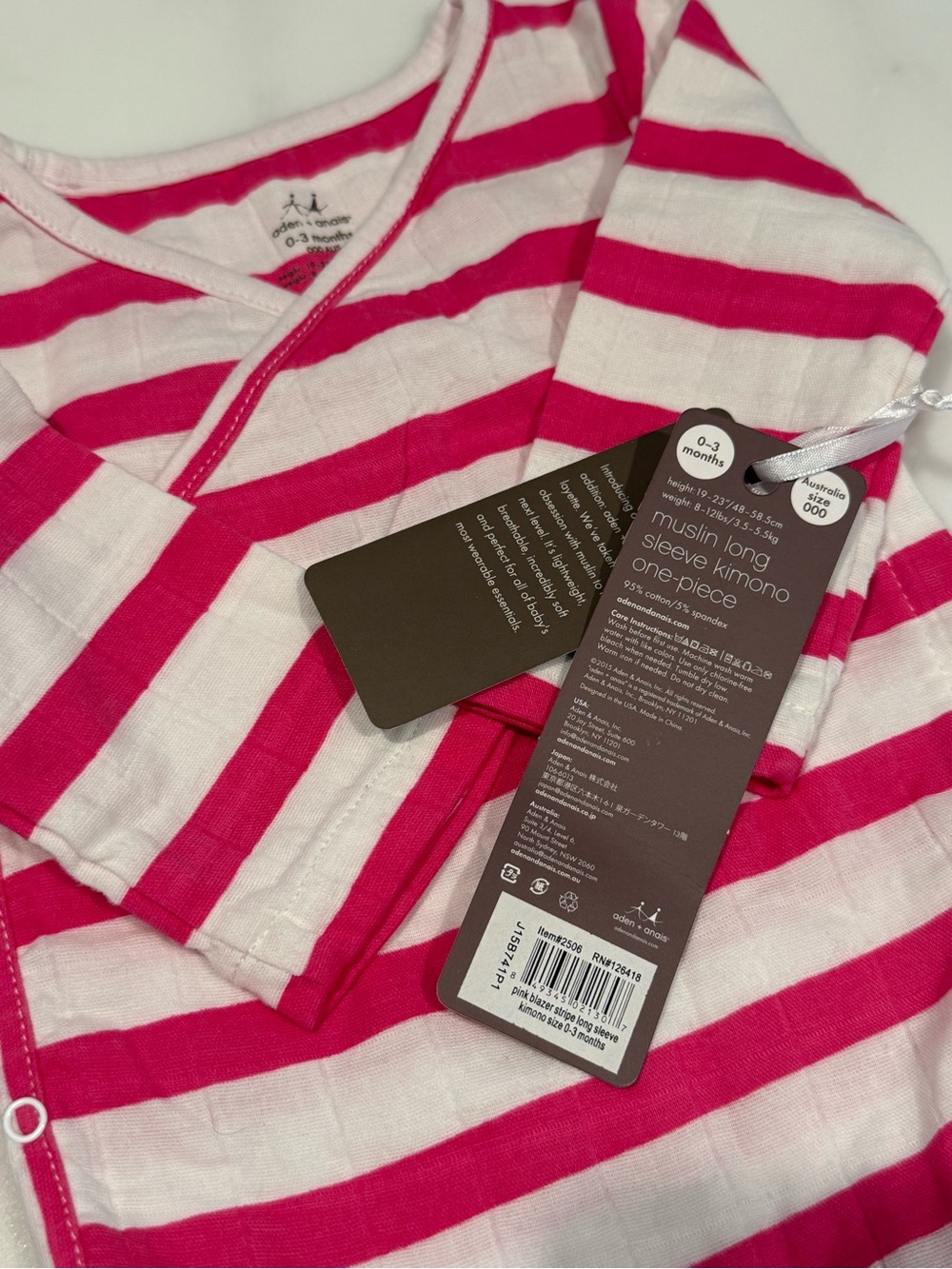 Perfect baby gift!
Soft cotton kimono footie in pink/white stripe